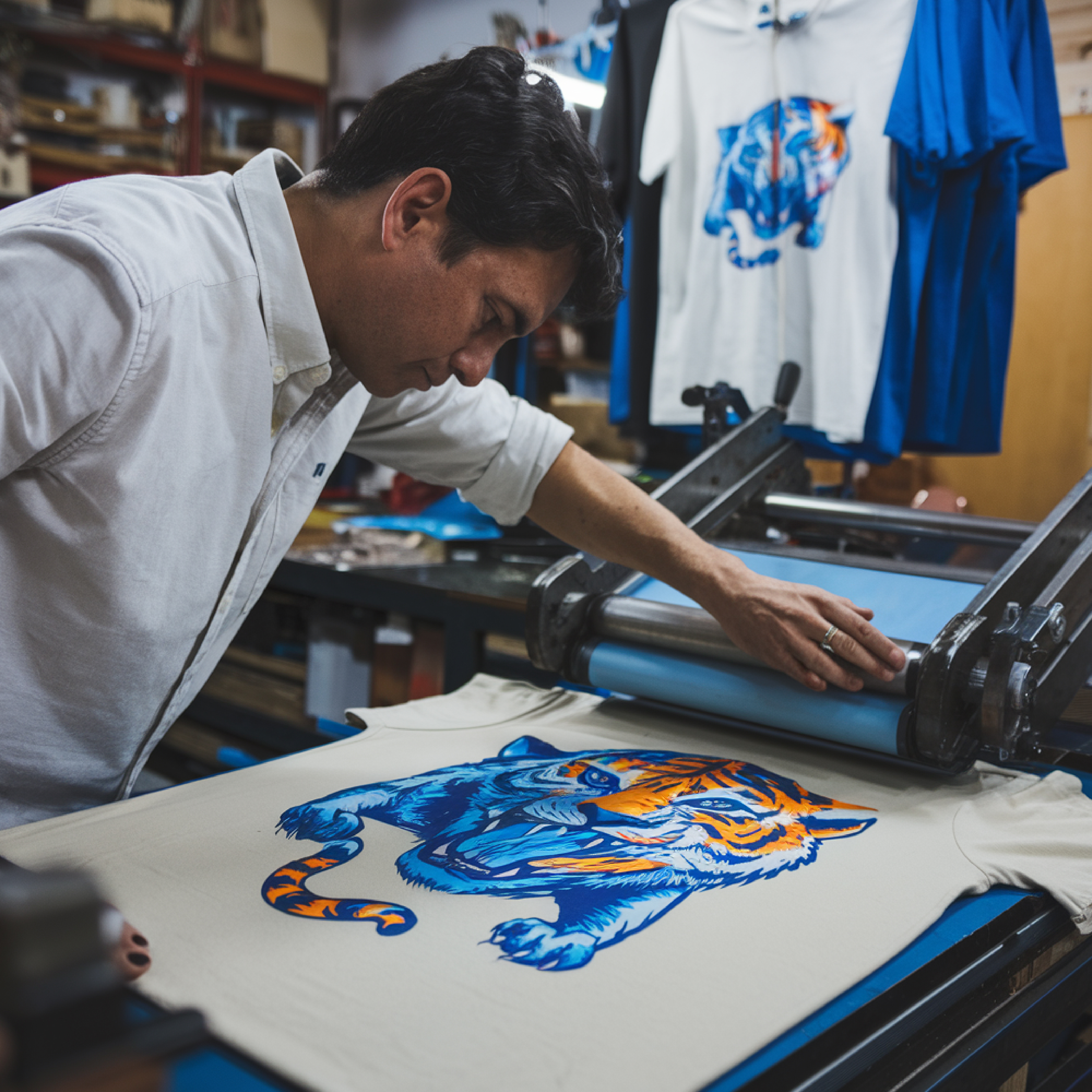 Man screen printing custom shirt